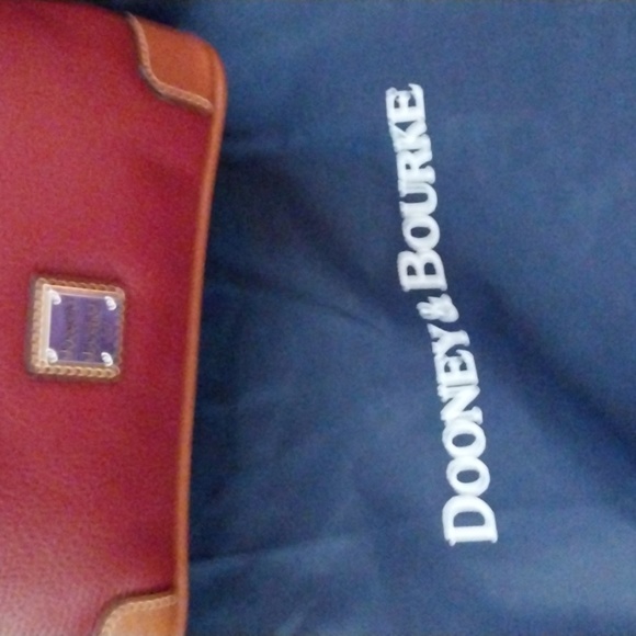 Dooney & Bourke zip top front zip bag. Gorgeous leather. Adjust strap NWOT - Picture 7 of 8